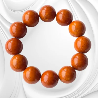 Elegancka bransoletka z kulek brązowego bursztynu