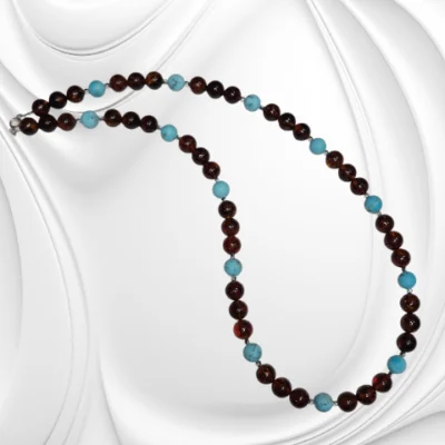 Wyjątkowy naszyjnik z koniakowego bursztynu i turkusu – biżuteria z hematytem i srebrnym zapięciem