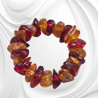 Bransoletka z bursztynu koniakowego z czerwonym akcentem na gumce jubilerskiej