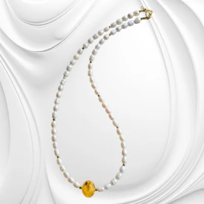 Naszyjnik z naturalnych pereł i bursztynu z hematytem – elegancja w złoconym srebrze