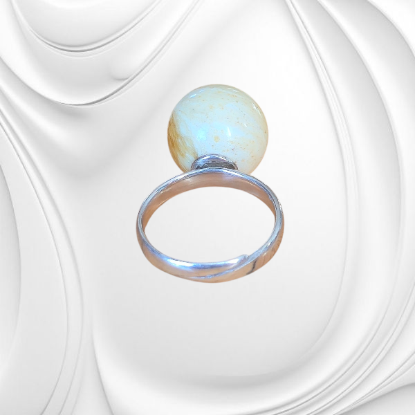 Srebrny regulowany pierścionek z mlecznym bursztynem bałtyckim