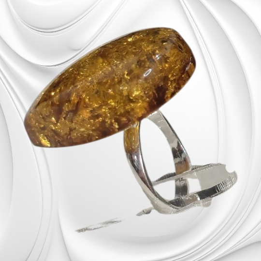 Pierścionek z bursztynem bałtyckim na regulowanej srebrnej obrączce