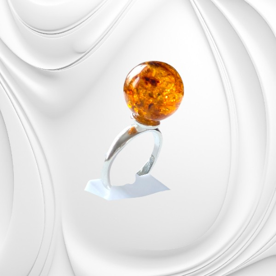 Pierścionek z kulką bursztynu bałtyckiego na regulowanej srebrnej obrączce