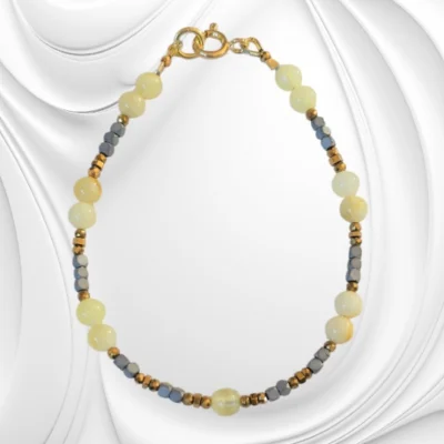 Bransoletka z bursztynu, hematytu i srebra złoconego – subtelna elegancja natury