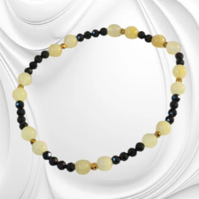 Bransoletka z bursztynu, czarnego turmalinu i hematytu na gumce jubilerskiej – naturalna elegancja