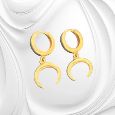 Srebrne złocone kolczyki na zapięciu typu kajdanki – ponadczasowa elegancja