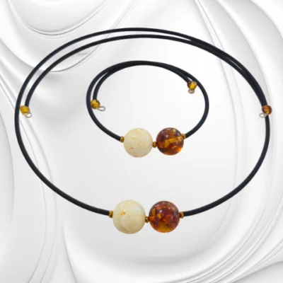 Komplet naszyjnik i bransoletka z bałtyckim bursztynem na czarnym kauczuku