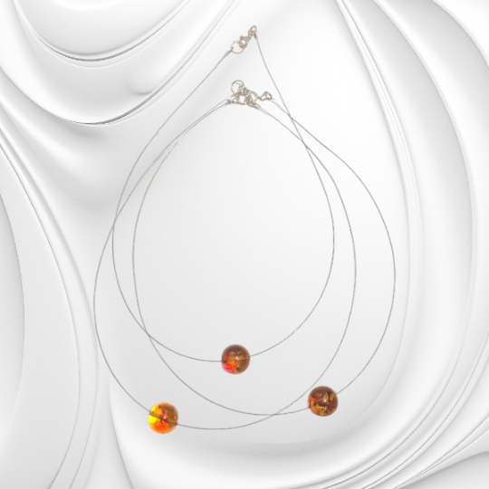 Naszyjnik z kulką bursztynu bałtyckiego w odcieniu koniakowym