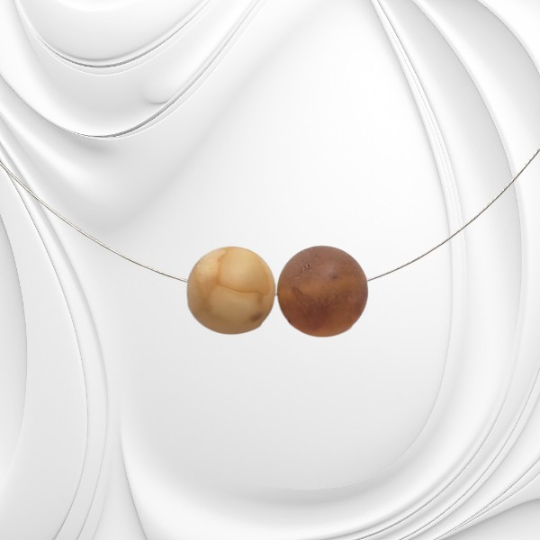 Naszyjnik z dwiema matowymi kulkami bursztynu bałtyckiego w odcieniu mlecznym i koniakowym