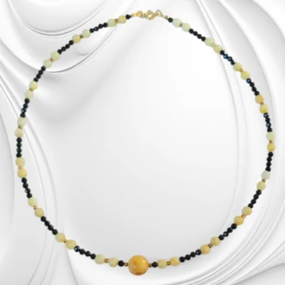 Naszyjnik z bursztynu, czarnego turmalinu i srebra złoconego – harmonia światła i głębi